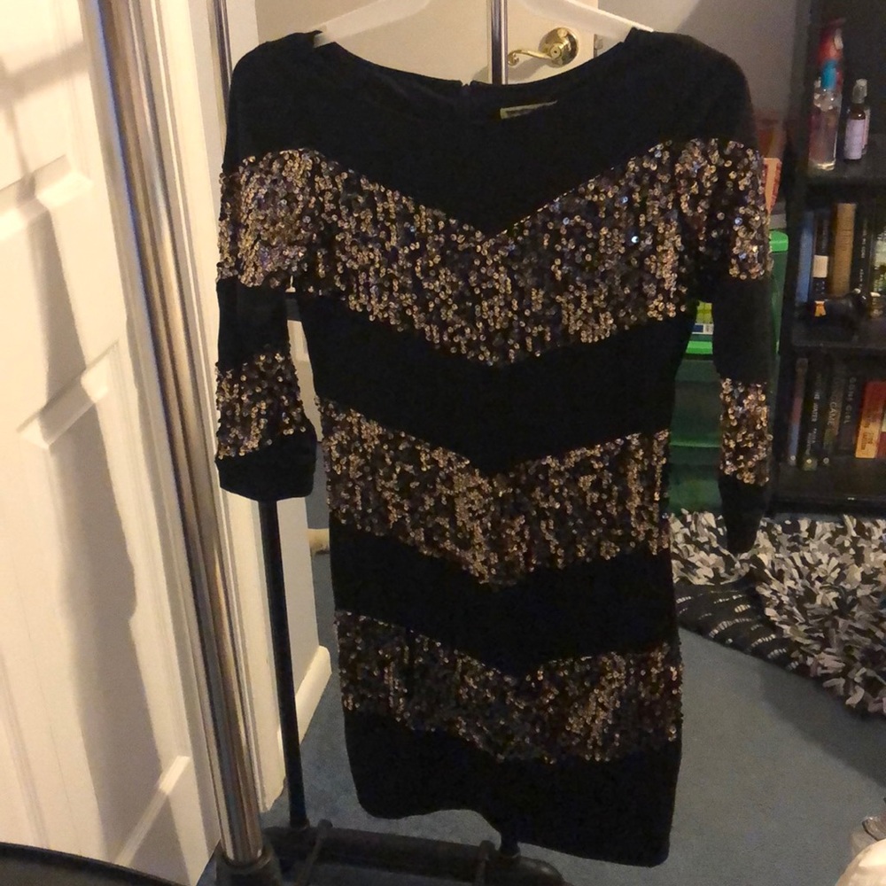 Black and gold sequin party dress